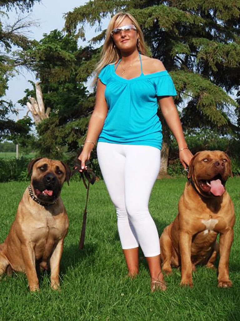 Woman with her two dogs at TorontoK9Center.com