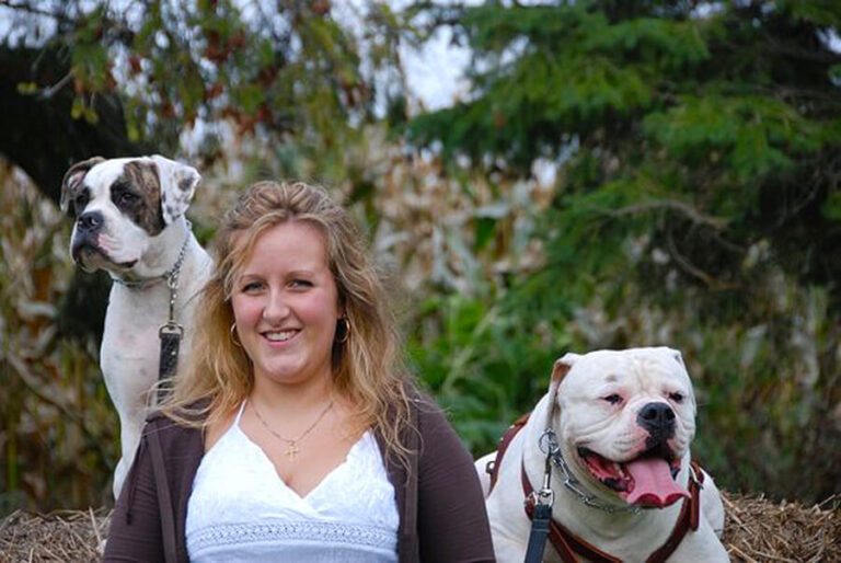 Woman with her two dogs at training Class TorontoK9Center.com
